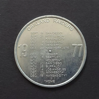 1977 NFL Oakland Raiders Metal Coin Schedule - Pinch Scotch Whisky - Image 1 of 4
