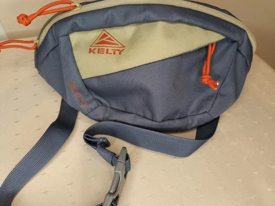 Bolso de Cadera Kelty Giddy 3 Azul Y Tostado Excelente Estado Usado Foto 1 de 4