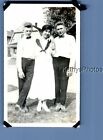 FOUND VINTAGE PHOTO D_7218 MEN POSED IN YARD WITH PRETTY WOMAN IN DRESS