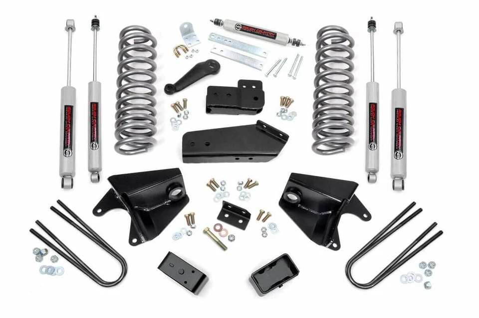 Kit de elevación Rough Country 4" amortiguadores cuádruples bloques traseros para Ford F-150 4x4 80-96 Foto 1 de 1