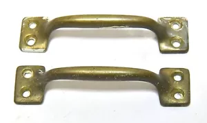 2 PULLONI/MANIGLIE ALZACRISTALLI VINTAGE IN OTTONE ABBINATI - Foto 1 di 5