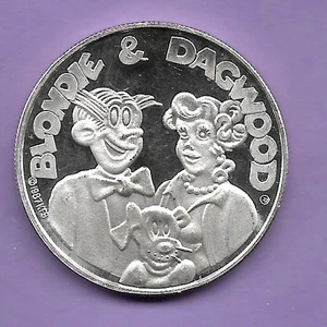 CARTOON CELEBRITIES – BLONDIE & DAGWOOD .999 SILVER ROUND - Picture 1 of 2