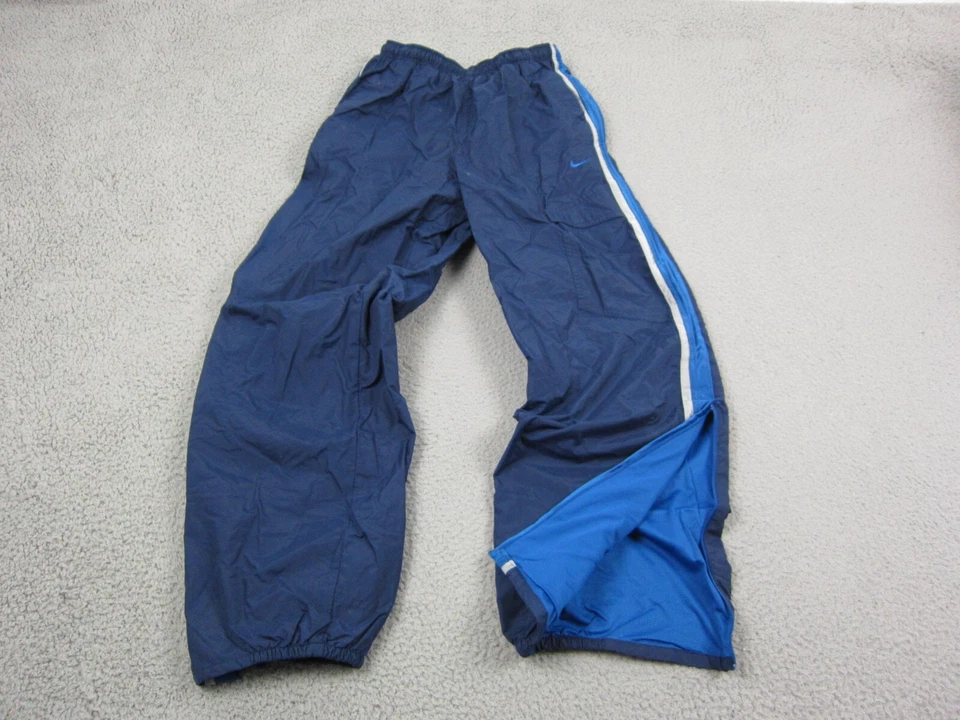 Pantalones NIKE Vintage Juveniles Extra Grandes XL Azul Atlético Años 90 Nylon Cortavientos Niños Foto 1 de 4
