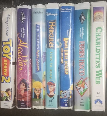 Lot of 7 VHS - Clamshell USED - TOY STORY, ALADDIN, ROBIN HOOD, CHARLOTTE'S WEB Foto 1 de 4