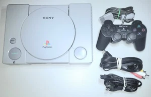 Consola de sistema Sony Playstation 1 PS1 gris SCPH-9001 + negra DS oficial cntrl en muy buen estado - Imagen 1 de 3