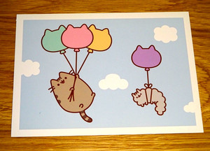 PUSHEEN CAT POSTCARD - PUSHEEN AND STORMY FLOAT AWAY WITH BALLOONS - NEW