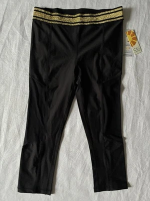 Leggings cropped preta nova com etiquetas C&C California malha aberturas laterais transparentes cintura dourada P - Imagem 1 de 4