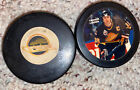 Vancouver Canucks and a Trevor Linden picture  puck