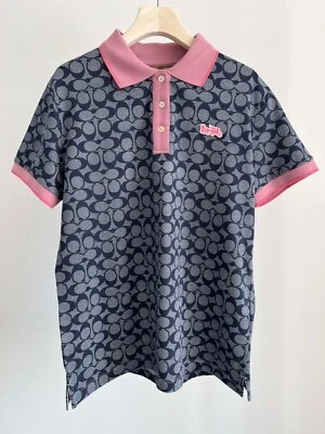 NUEVO CON ETIQUETAS COACH Mujer Azul Marino Rosa Estampado Polo Camiseta Algodón Orgánico Foto 1 de 4