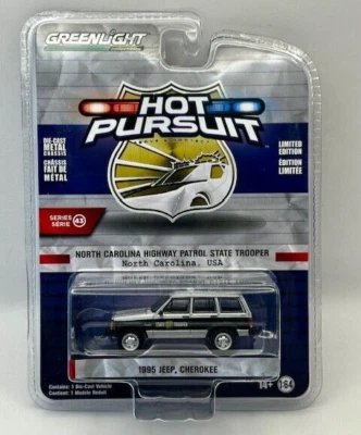 Greenlight Hot Pursuit North Carolina Highway Patrol 1995 Jeep Cherokee 1:64 - Image 1 of 2
