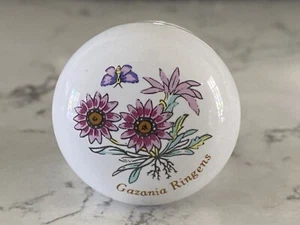 Tiradores de cajón de porcelana blanca floral Gazania Ringens perillas Amerock 23 disponibles de colección - Imagen 1 de 14