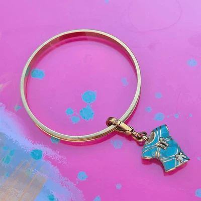 Brazalete Brazalete Juicy Couture Y2K Tono Dorado con Camiseta Azul "Elige Jugosa" Lazo Cha Foto 1 de 4