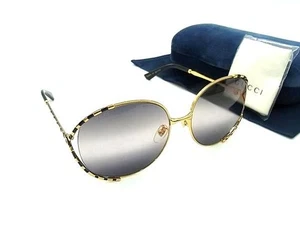 GUCCI GG0595S 001 Gafas de sol G entrelazadas Gafas para mujer Hombre Dorado x Negro A - Imagen 1 de 4