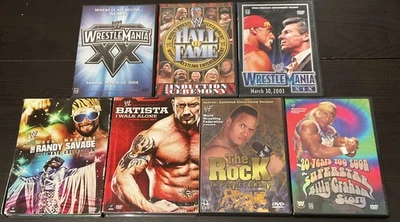 WWE Lot of 7: Randy Savage, Wrestlemania 19, 20, Batista, The Rock, Hall of Fame - Image 1 of 4