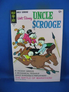 Tío Scrooge 75 casi nuevo - Batalla de Maratón 1968 llave de oro de alto grado - Imagen 1 de 2