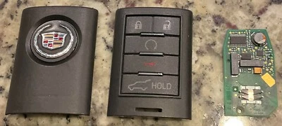 Cadillac SRX 2010-2014 llavero transmisor usado control remoto de 5 botones 22865375 Foto 1 de 4