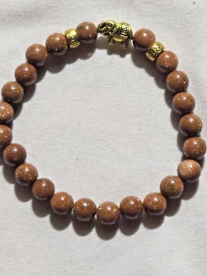 Pulsera Elefante Tono Oro Piedra Oro Natural 7.5" Foto 1 de 4