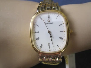bx 055 mans/ ladys gold plate and s.steel ETERNA date quartz watch bracelet - Picture 1 of 6