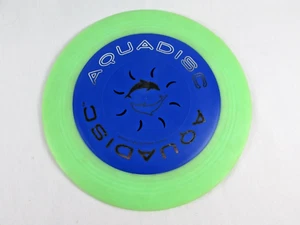 Disco volador submarino AquaDisc de colección AquaDisc disco acuático piscina juguete agua azul y verde - Imagen 1 de 9