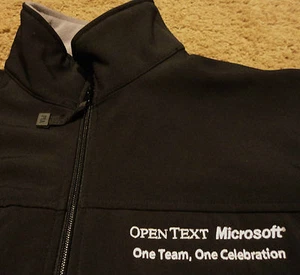 MICROSOFT OPEN TEXT ONE TEAM bestickte Jacke Windbreaker für Übershirt Large - Bild 1 von 5
