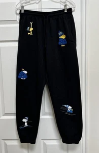 Pantalones deportivos de invierno Aeropostale Peanuts Snoopy negros polar adulto medianos Usado en excelente estado - Imagen 1 de 13