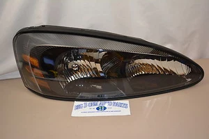 Pontiac Grand Prix Right Hand Passenger Side Headlight Lamp new OEM 25851403 - Picture 1 of 1