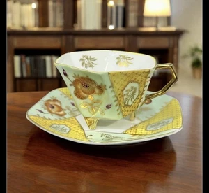 Porcelain teacup and saucer set by UCAGCO with gold floral design - Picture 1 of 6