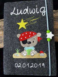U-Heft Hülle Pirat Bär Sternschnuppe Teddy mit Wunsch-Namen und Geburtsdatum - Bild 1 von 2