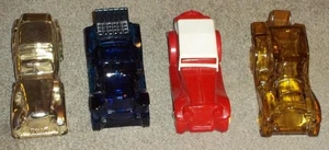 4 AVON DECANTERS PACKARD ROADSTER, SOLID GOLD CADILLAC, 1936 MG, STANLEY STEAMER - Picture 1 of 1