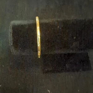 1/10 CT. T.W. Diamond Bangle Bracelet in Sterling Silver with 14K Gold Plate - Picture 1 of 7