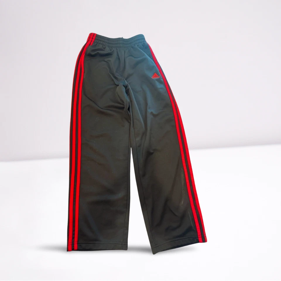 Pantalones deportivos Adidas para jóvenes y niños relajados a rayas activos negros/rojos talla M en muy buena condición Foto 1 de 3