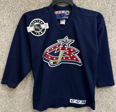 Camiseta deportiva de hockey CCM NHL Center Ice YOUTH talla L/XL azul Columbus Foto 1 de 4