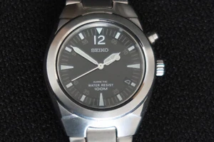 SEIKO 5M62 0A90 KINETIC UHR BLACK & WHITE DIAL EDELSTAHLBAND EIN KLASSIKER - Bild 1 von 9