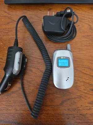 Teléfono plegable LG UX210 plateado (celular de EE. UU.) Foto 1 de 4