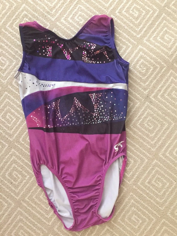 Leotardo de gimnasia para niña GK Elite Cirque Du Soleil púrpura y rosa S Foto 1 de 4
