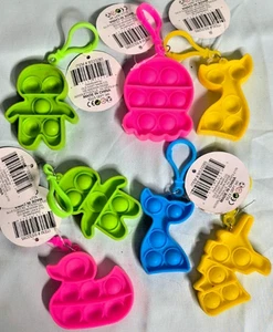 7 Pack Fidget Poppers Multiple Colors & Shapes Brand New - Picture 1 of 1