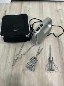 Oster 270W Mezclador de Mano 7 Velocidades con Turbo Boost + Estuche de Almacenamiento y Accesorios LEER - Imagen 1 de 18