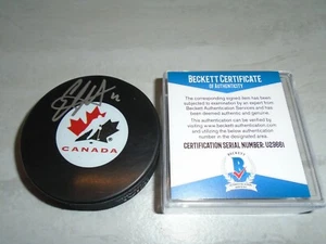 Eric Staal signed Team Canada Hockey Puck handsigniert Beckett BAS COA 1A - Bild 1 von 4