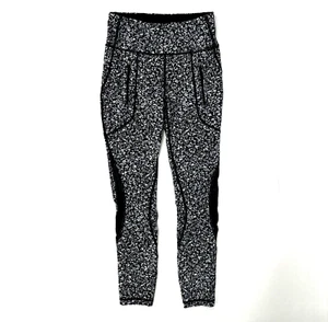 Lululemon Invigorate 7/8 stretto taglia 4 margherita polvere bianco alpino nero ECCELLENTE - Foto 1 di 10