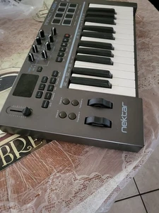 Nektar IMPACT LX25+ 25 Keys 8 Pads MIDI Controller - Picture 1 of 2