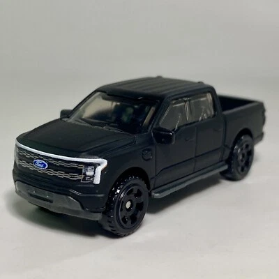 2022 Ford F-150 Lightning Matte Black 1:64 Diecast Diorama Pickup Truck #28 - Image 1 of 4