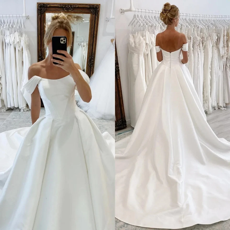 Elegantes vestidos de novia de satén fuera del hombro botón trasero barrido tren vestidos de novia Foto 1 de 4