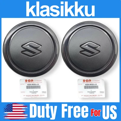 TAPA CENTRAL RUEDA SUZUKI VITARA ESCUDO SIDEKICK SAMURAI JIMNY SIERRA GENUINA 2 un. Foto 1 de 4