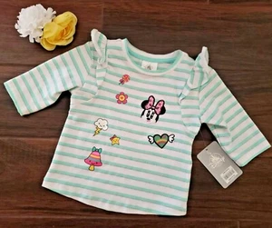 Top camicia bianca a righe manica lunga bambina Disney Store toppa Minnie Mouse taglia 2 - Foto 1 di 7