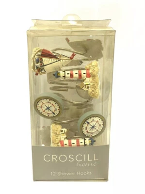 Ganchos de ducha náuticos azules decorativos Croscill Home Fashion 1 docena de anillos de gancho Foto 1 de 4