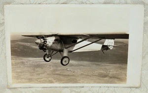 156w. AZO RPPC, SHOWS COL. CHAS. LINDBERGH'S SPIRIT OF ST. LOUIS IN FLIGHT 1927 - Picture 1 of 2