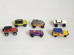Konvolut (6) Matchbox Hot Wheels Offroad Offroad Autos Trucks SUV Jeep Crawlers - Bild 1 von 7