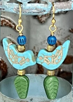 Pendientes Paloma Paz Oro y Turquesa. Amor. Pájaros azules Foto 1 de 3