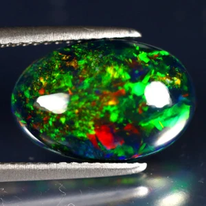 3.44 ct Best Oval Cabochon (14 x 10 mm) Ethiopian Flashing Black Opal - Picture 1 of 2