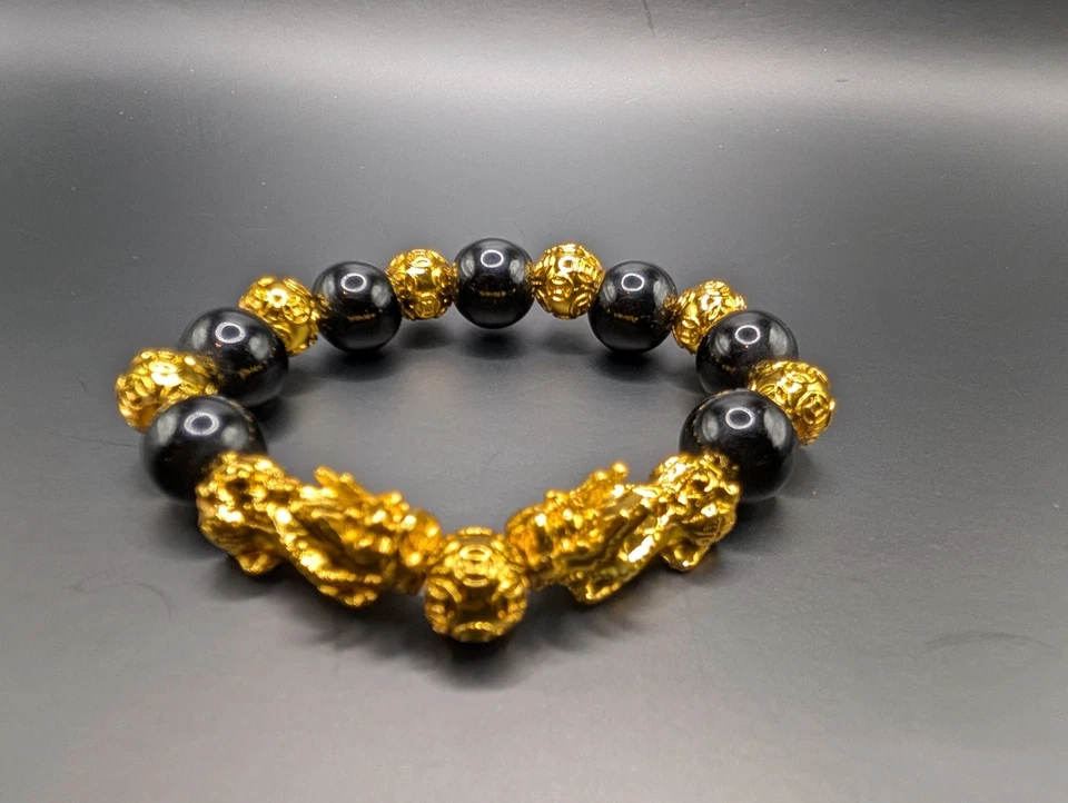 Pulsera Feng Shui Pixiu con cuentas de obsidiana negra y aleación chapada en oro 7" Foto 1 de 3